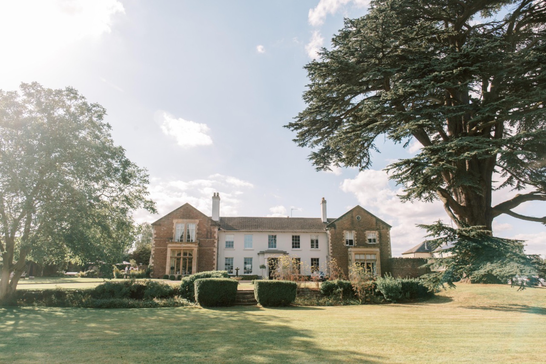 The Glewstone Court manor with the 500-year-old Cedar of Lebanon on the south lawn
